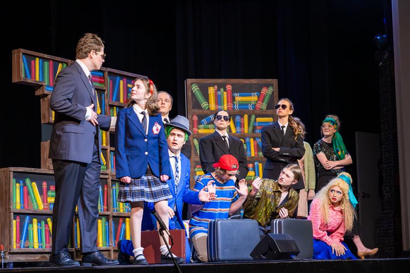 Students perform onstage